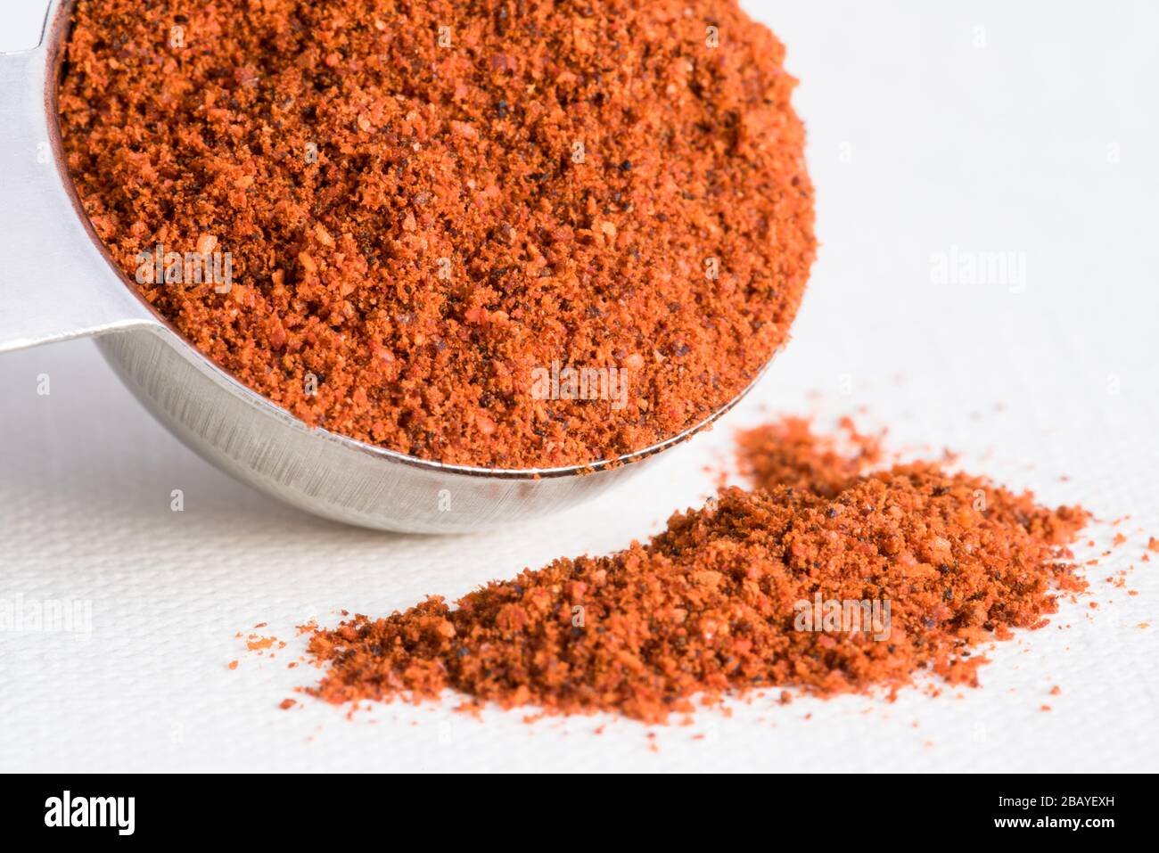 Chipotle Chili Powder Spilled from a Teaspoon Stock Photo Alamy