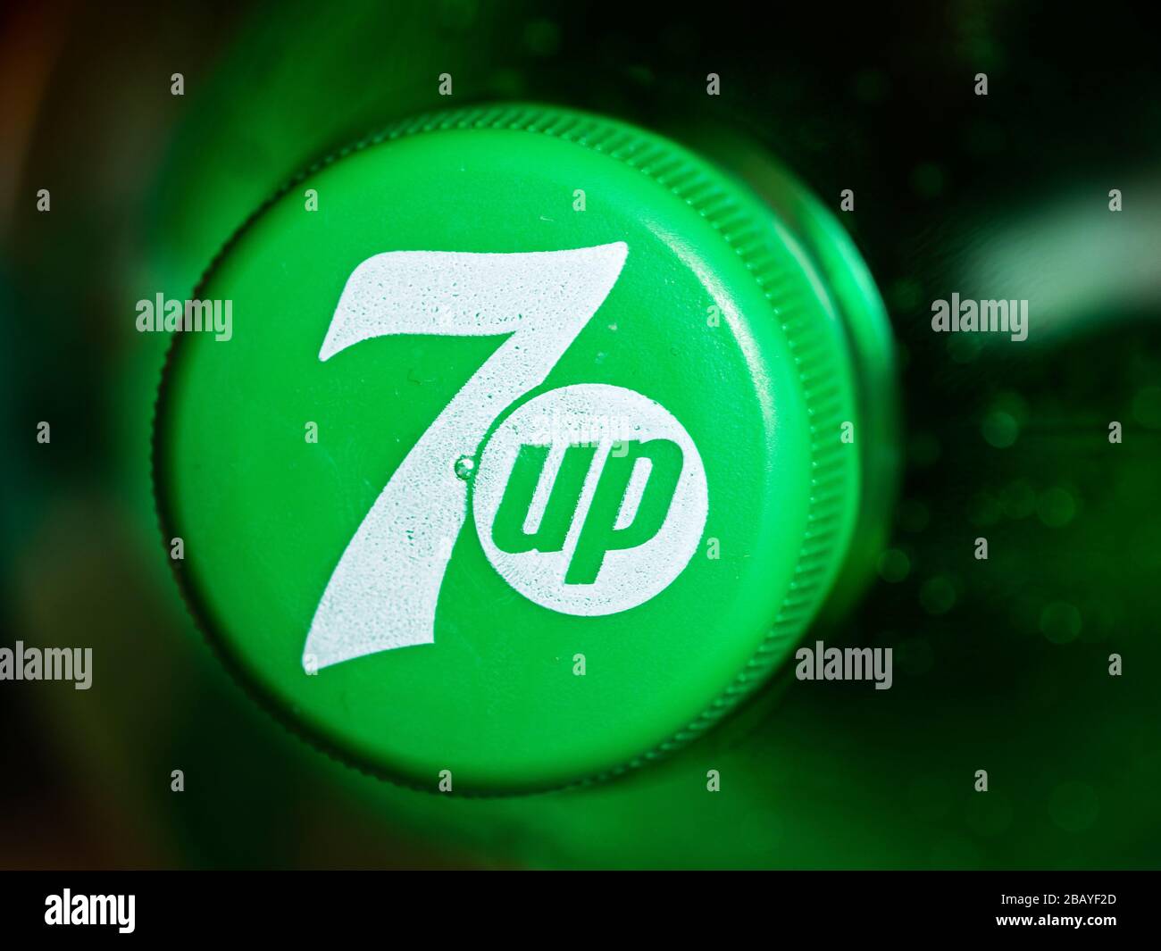 In this photo illustration a 7up logo seen displayed on a bottle cap. Stock Photo