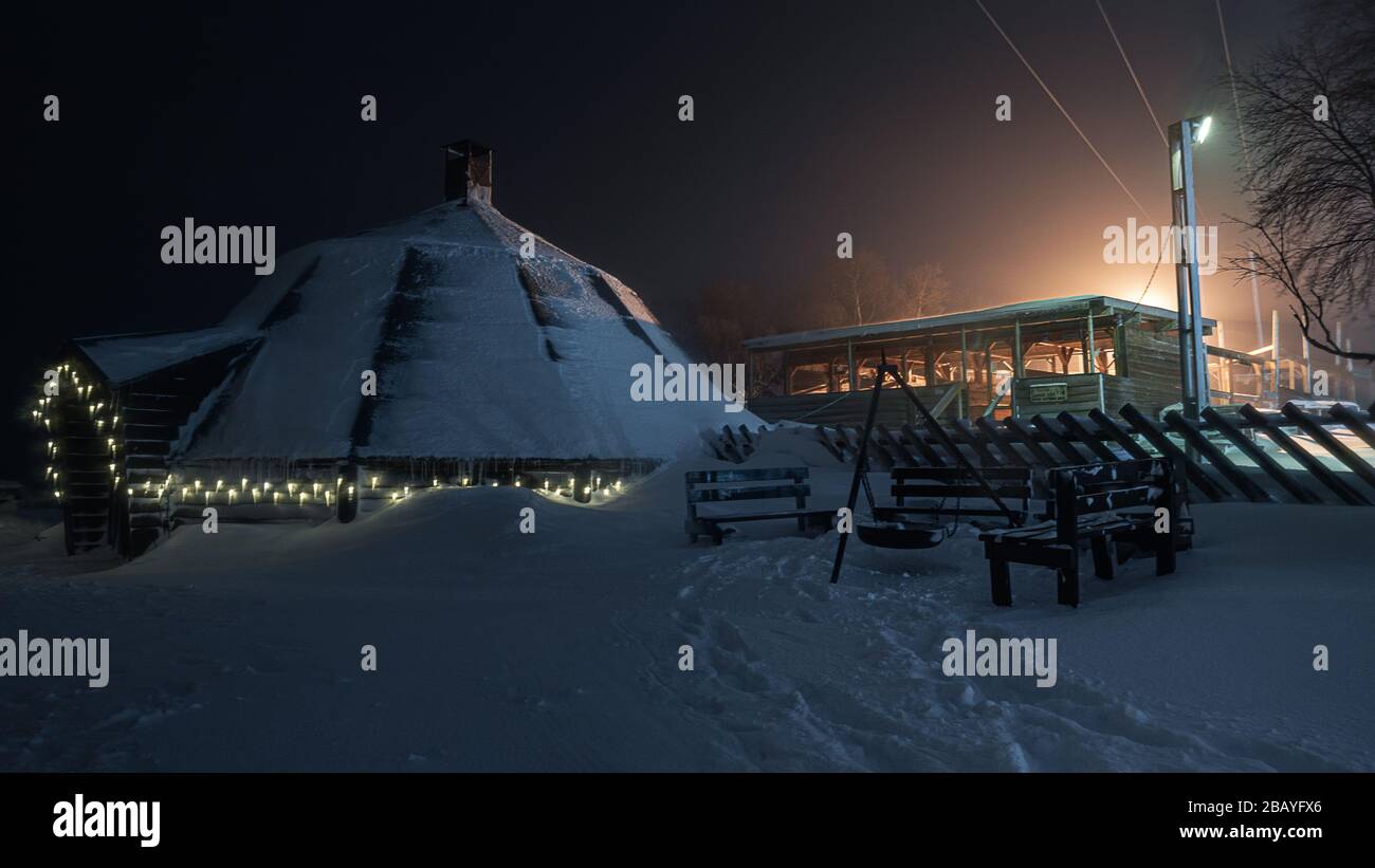 Tromso, Norway, night lights in winter near the hut. Stock Photo