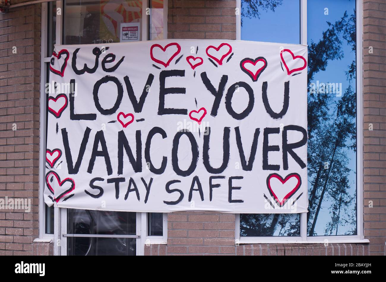 Vancouver, Canada - March 28,2020: A View of sign 'Love You Vancouver Stay Safe' on a Vancouver’s bike rental shop 'Spokes' Stock Photo