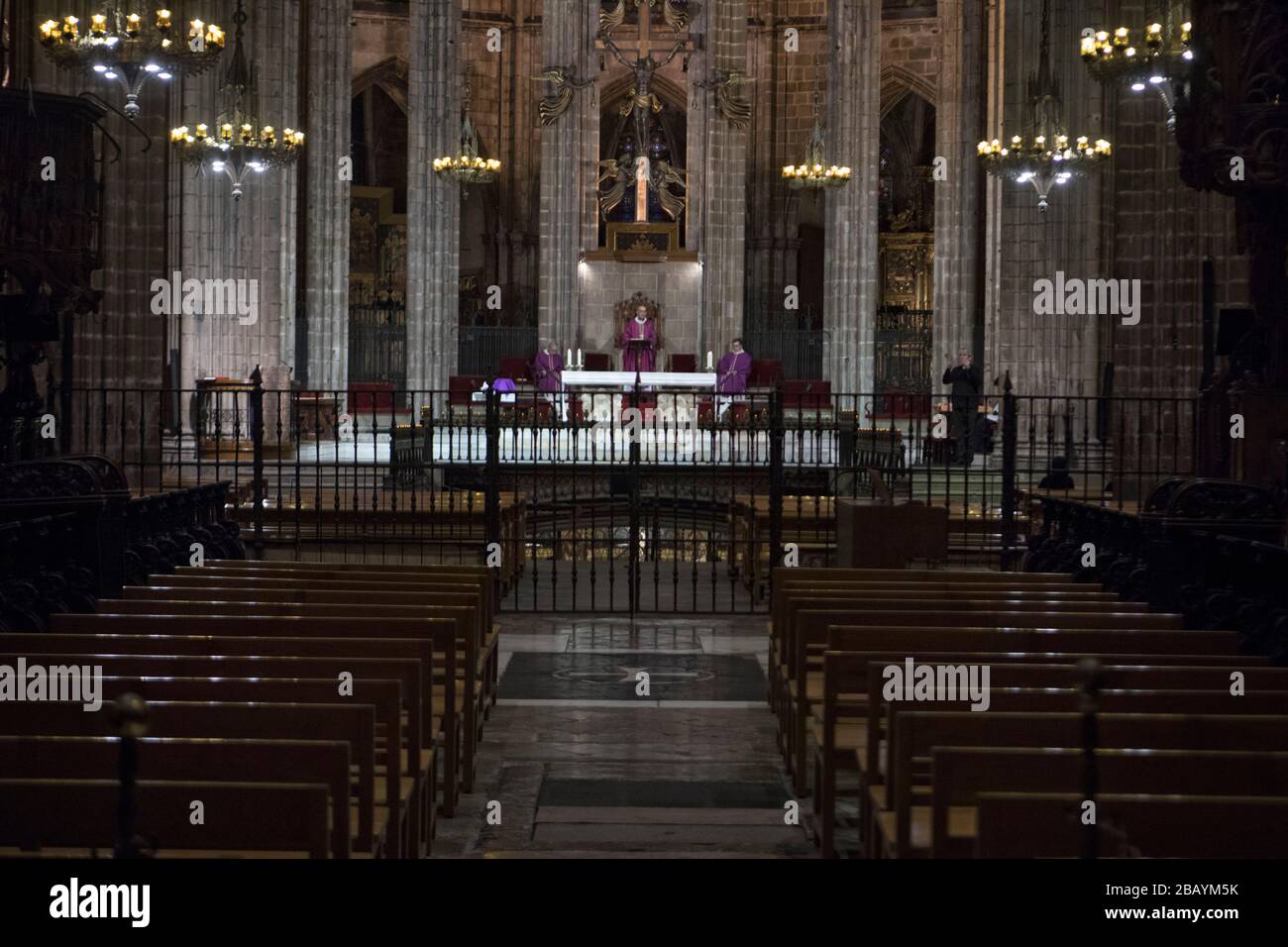Mass at the Cathedral of Barcelona behind closed doors. Stock Photo