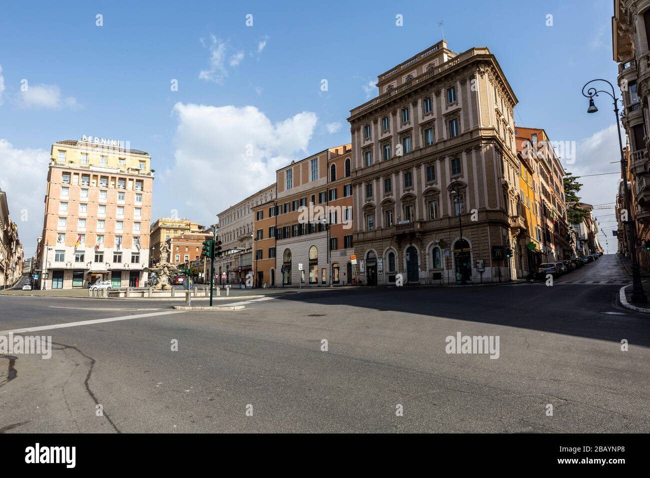 Rome, Italy, 29, Mar, 2020. Piazza Barberini in Rome deserted on a sunny Sunday afternoon on Italy's 19th day of lockdown due to the Coronavirus Covid-19 pandemic. Credit: Stephen Bisgrove/Alamy Live News Stock Photo