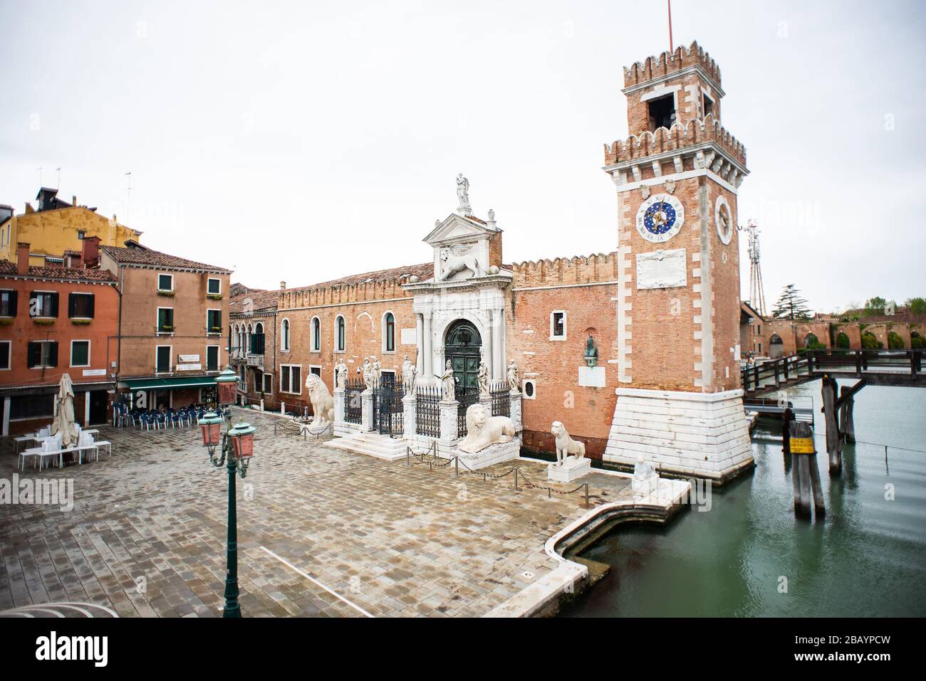 Venice. Italy - May 13, 2019: The Main Gate at the Venetian Arsenal (Arsenale di Venezia). View from Ponte del Paradiso. Canal Rio dell Arsenale. Stock Photo