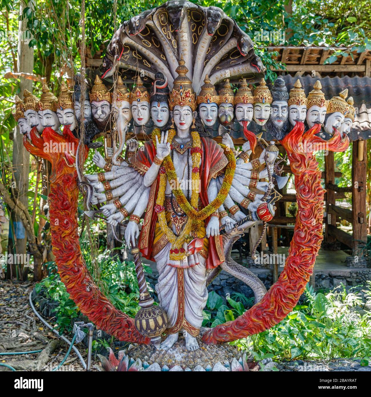 Statue of Vishvarupa or Universal form,  an iconographical form and theophany of the Hindu god Vishnu or his avatar Krishna. Bali, Indonesia. Stock Photo