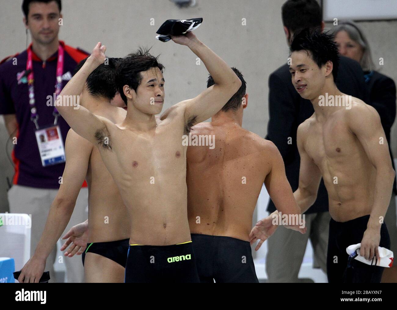 China's Yinan Wang (left) after his team win the gold medal during the ...