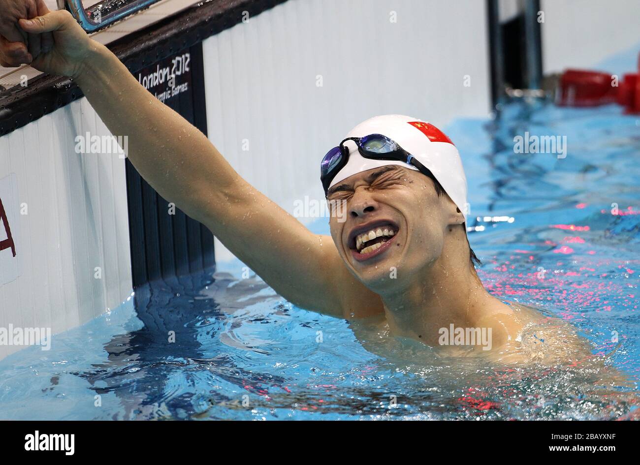China's Yinan Wang after winning his leg and the gold medal during the ...