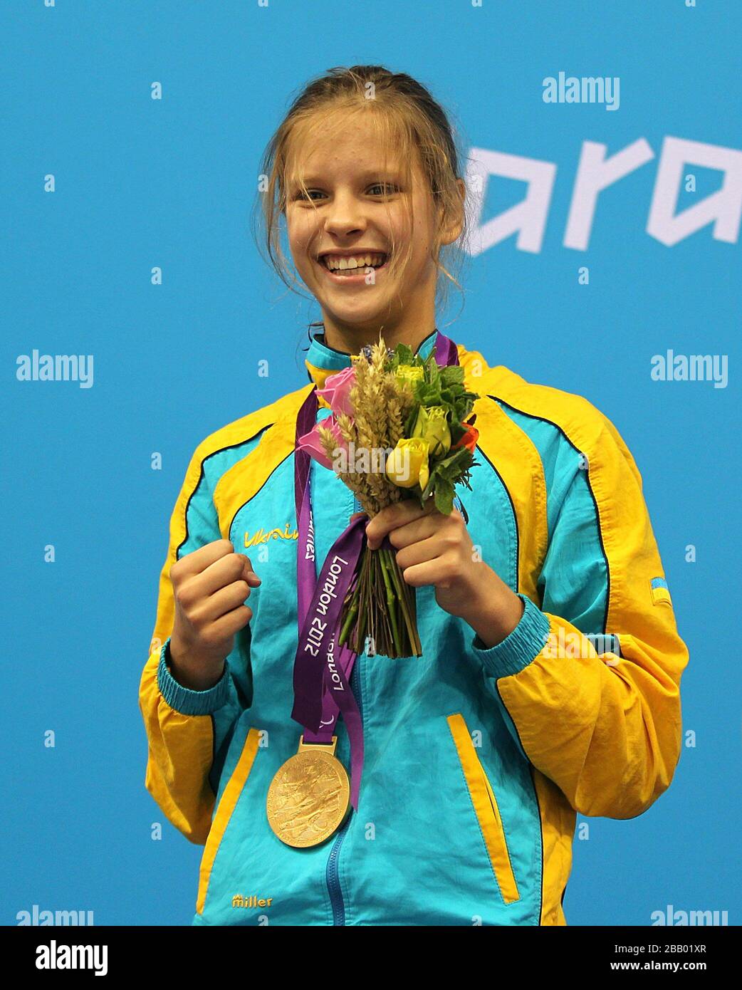 Gold Medalist Ukraine's Viktoriia Savtsova celebrates after the Women's 100m Breaststroke - SB6 Final at the Aquatics Centre, London. Stock Photo