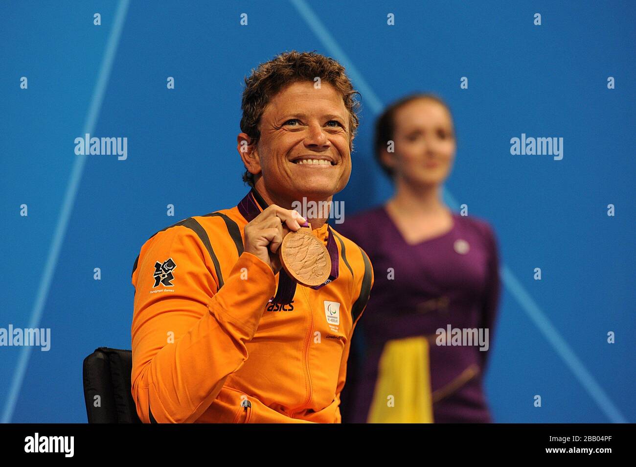 Netherland's Mirjam de Koning-Peper celebrates with her Bronze medal after finishing third in the Women's 100m Backstroke - S6 Stock Photo