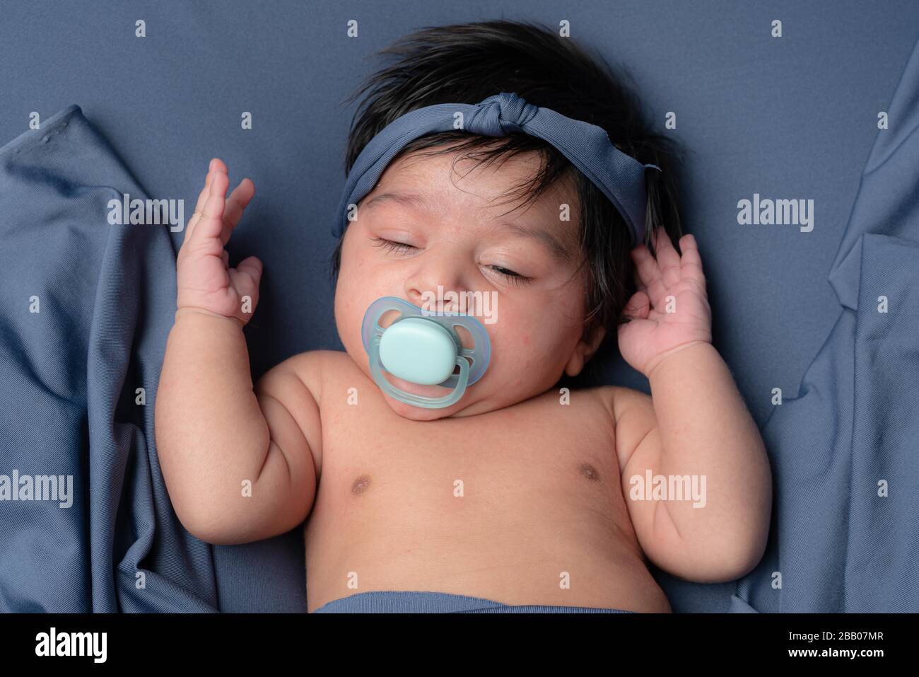 Newborn with pacifier hires stock photography and images Alamy