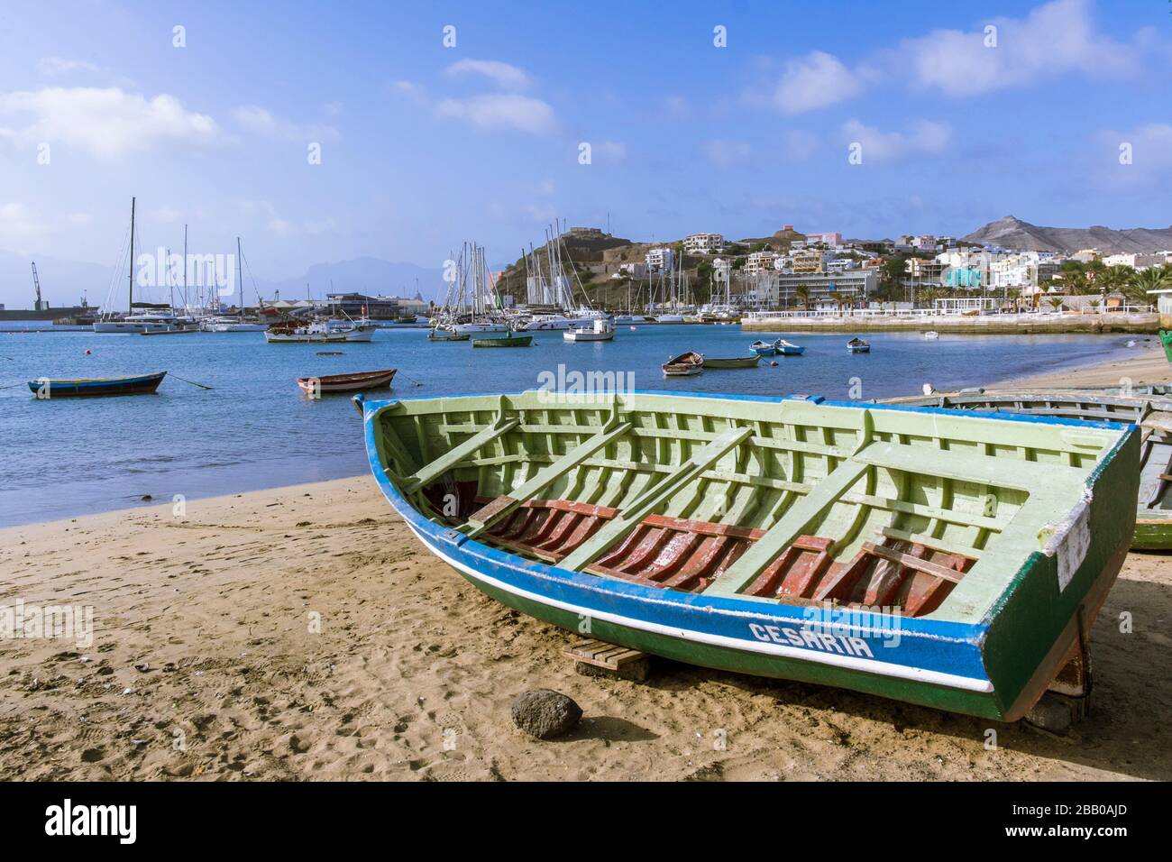 Fishing boat on the Beach at Praia de Bote and Porto Grande Bay, Mindelo, Sao Vicente, Cape Verde Islands, Africa. Stock Photo