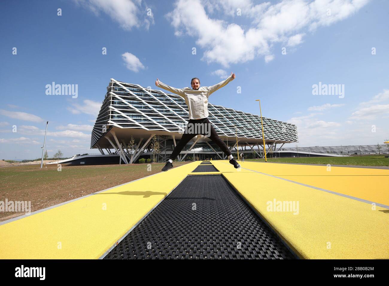 firo: April 30, 2019 Adidas, Herzogenaurach, Campus The new building of the  Behnisch architectural office is spectacular. He stands on stilts, the  honeycomb-shaped shell is based on a stadium. However, it is