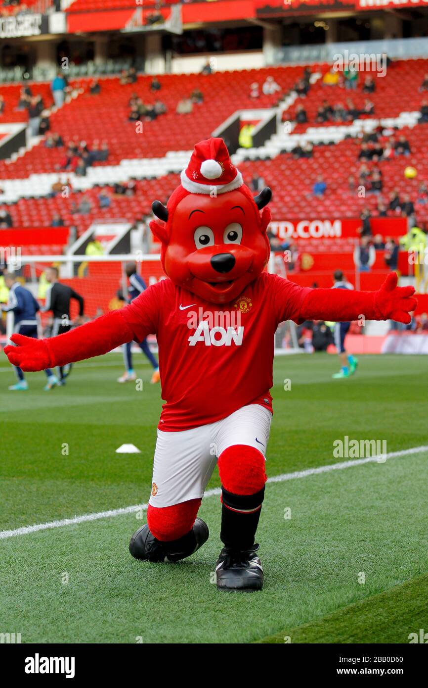 Manchester United mascot Fred the Red entertains fans before kick-off Stock  Photo - Alamy