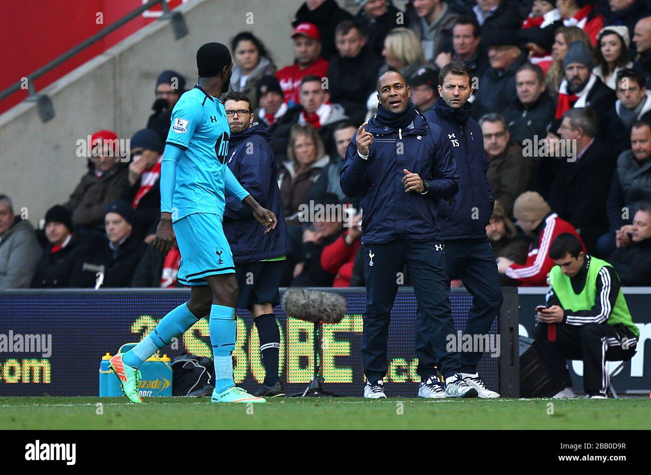 Tottenham Hotspur's Emmanuel Adebayor is given instructions by Les Ferdinand Stock Photo