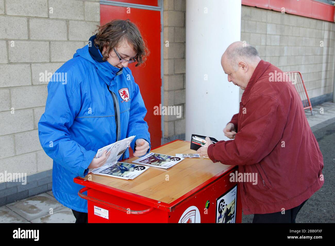Programme Seller A programme seller outside The Riverside Stadium Stock Photo - Alamy