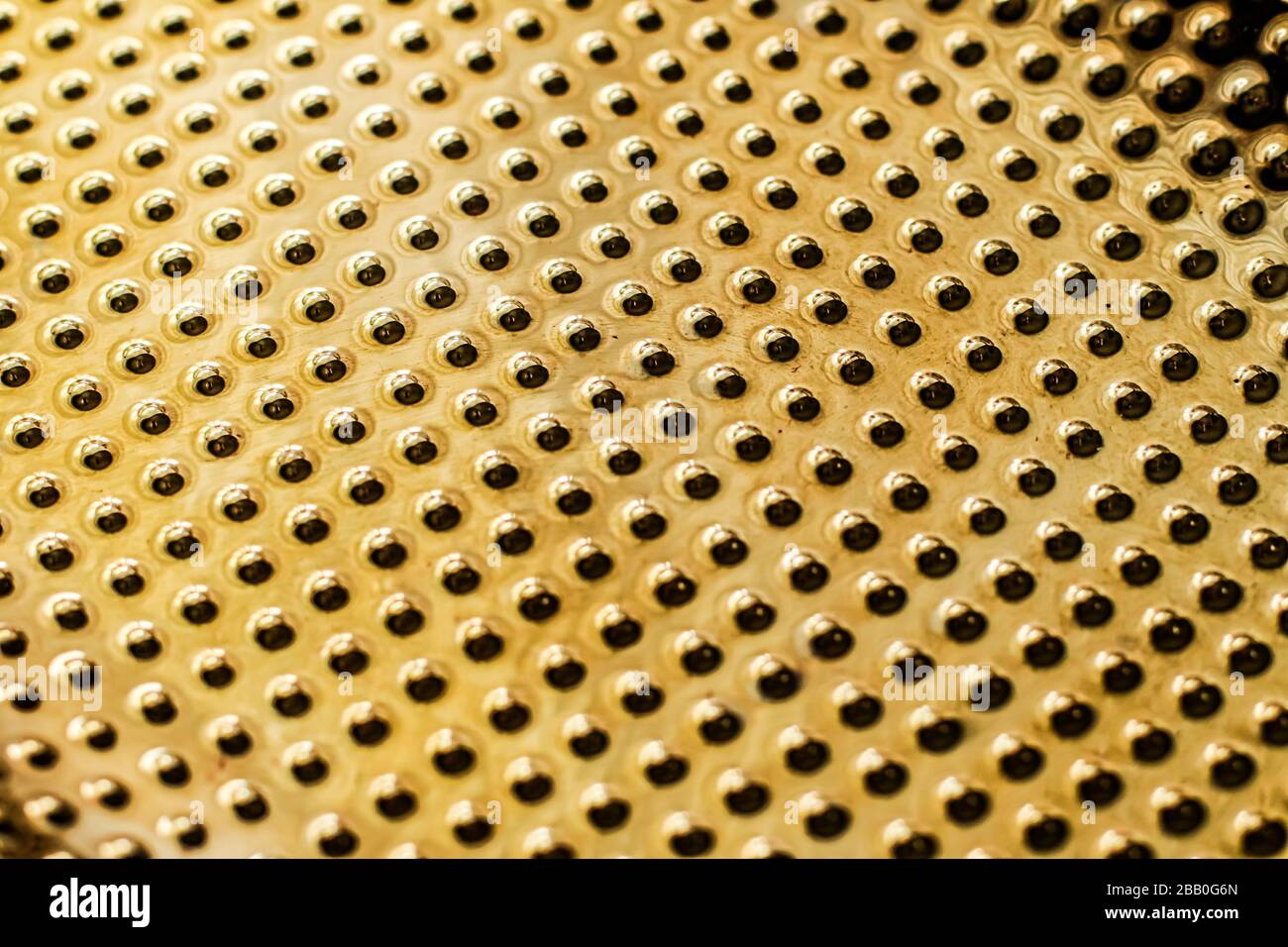 Texture of golden metallic surface as background, materials and ...