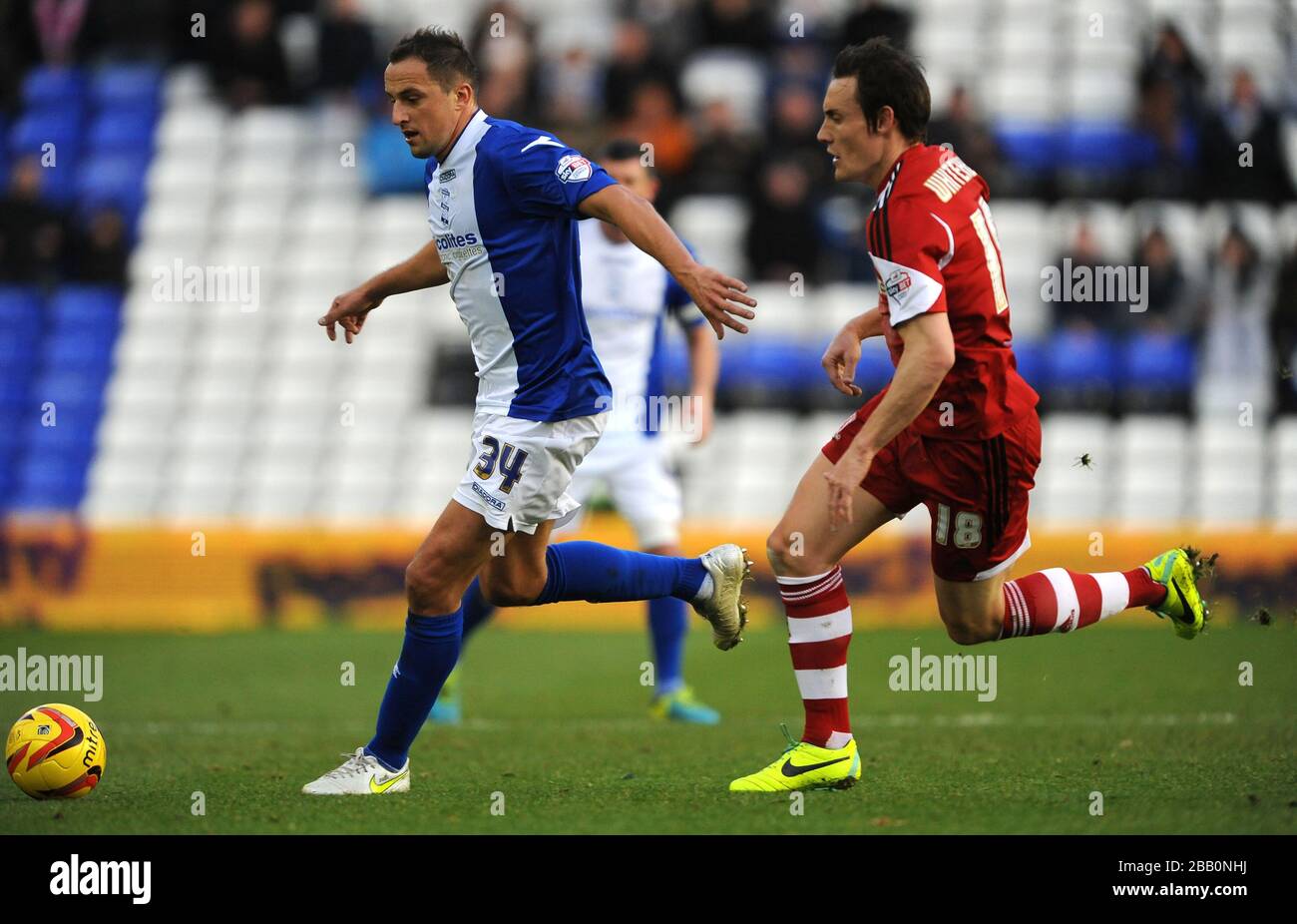 Birmingham City's Dariusz Dudka (left) and Middlesbrough's Dean Whitehead (right) battle for the ball. Stock Photo