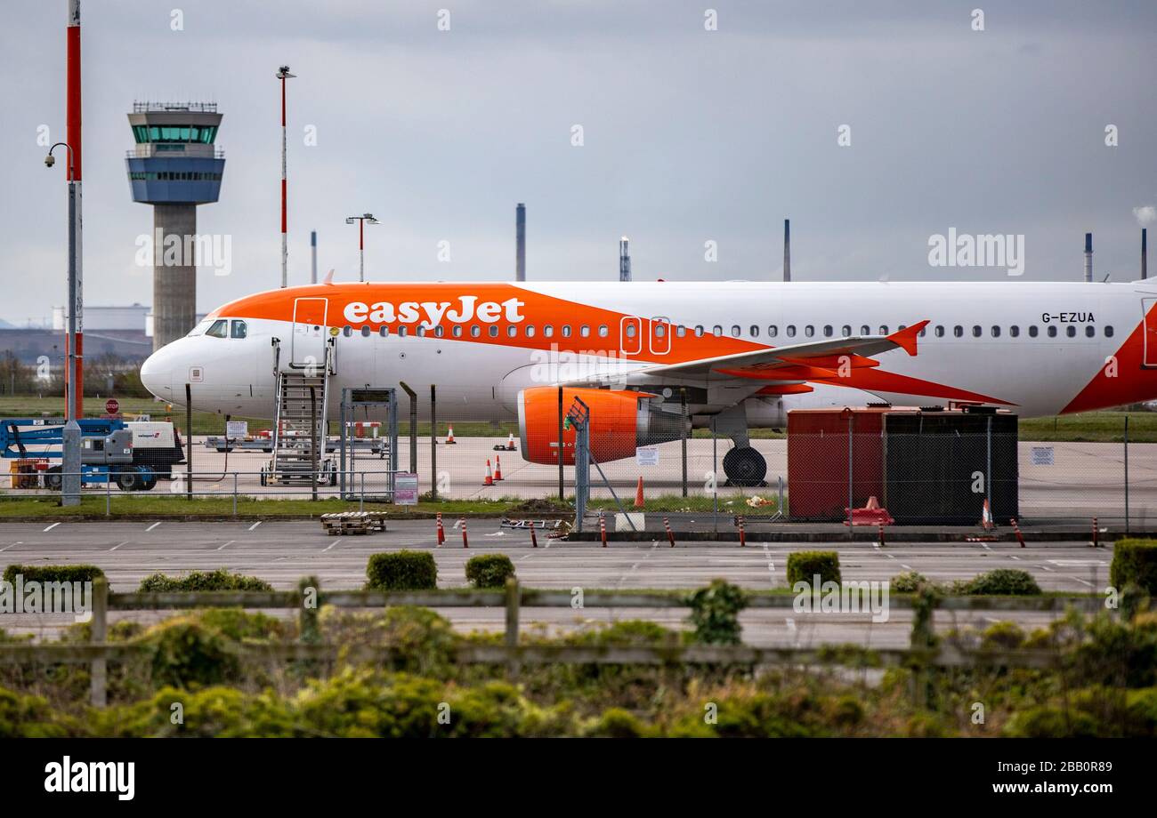 An EasyJet plane sits on the tarmac at Liverpool John Lennon Airport, after the airline announced it has grounded its entire fleet of 344 aircraft due to the coronavirus pandemic. Stock Photo