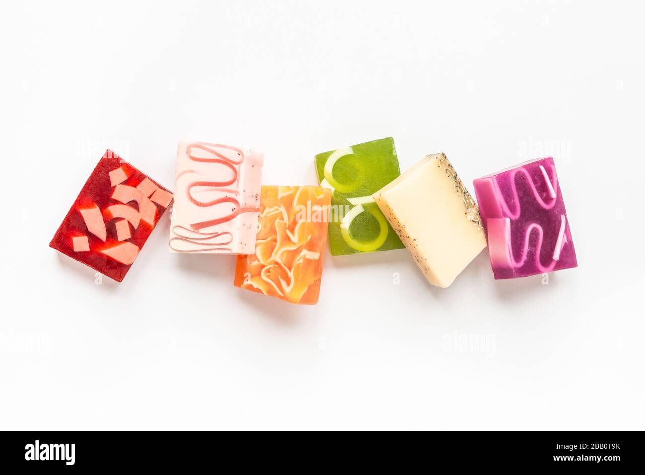 Top view of various colorful handmade soaps. Organic health care and protection. Stock Photo