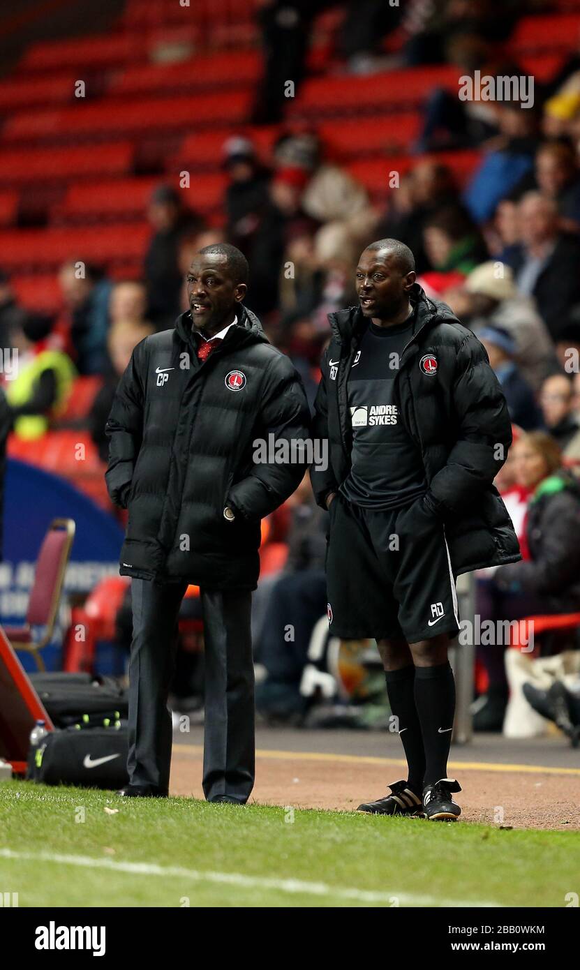 Charlton Athletic's Manager Chris Powell (left) and Assistant Alex Dyer on the touchline Stock Photo