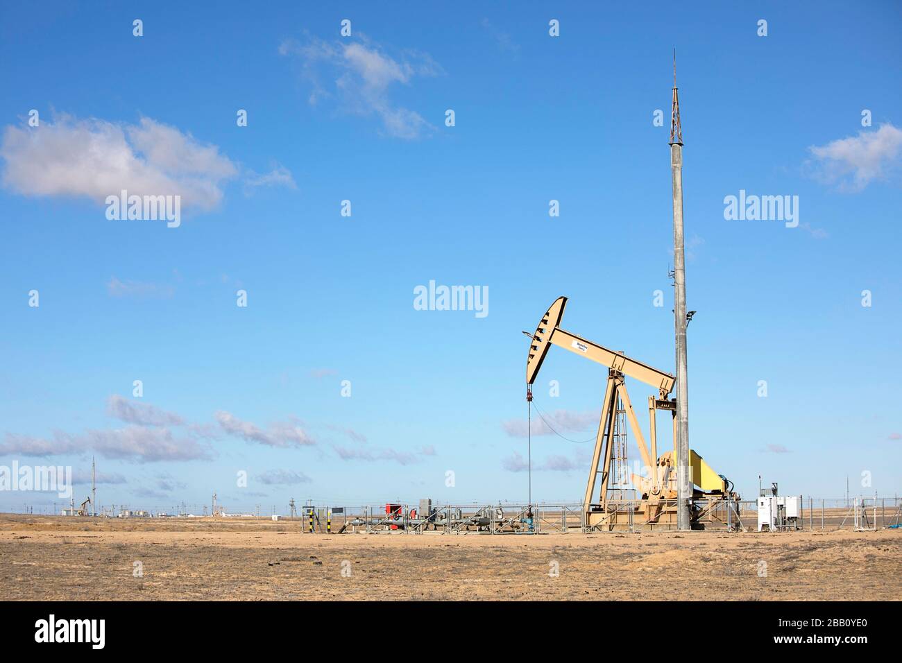 Pumping Oil on the coast at Caspian Sea, Aktau, Kazakhstan, bore oil crane pump Stock Photo