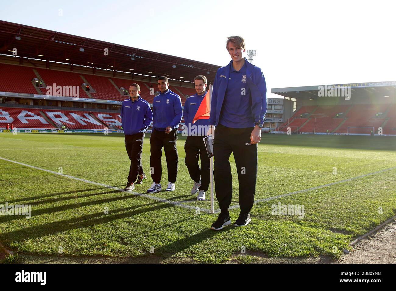 Birmingham City's Dariusz Dudka, Tom Adeyemi, Andrew Shinnie and Dan Burn (left to right) on a pitch walk before the game at Oakwell Stock Photo