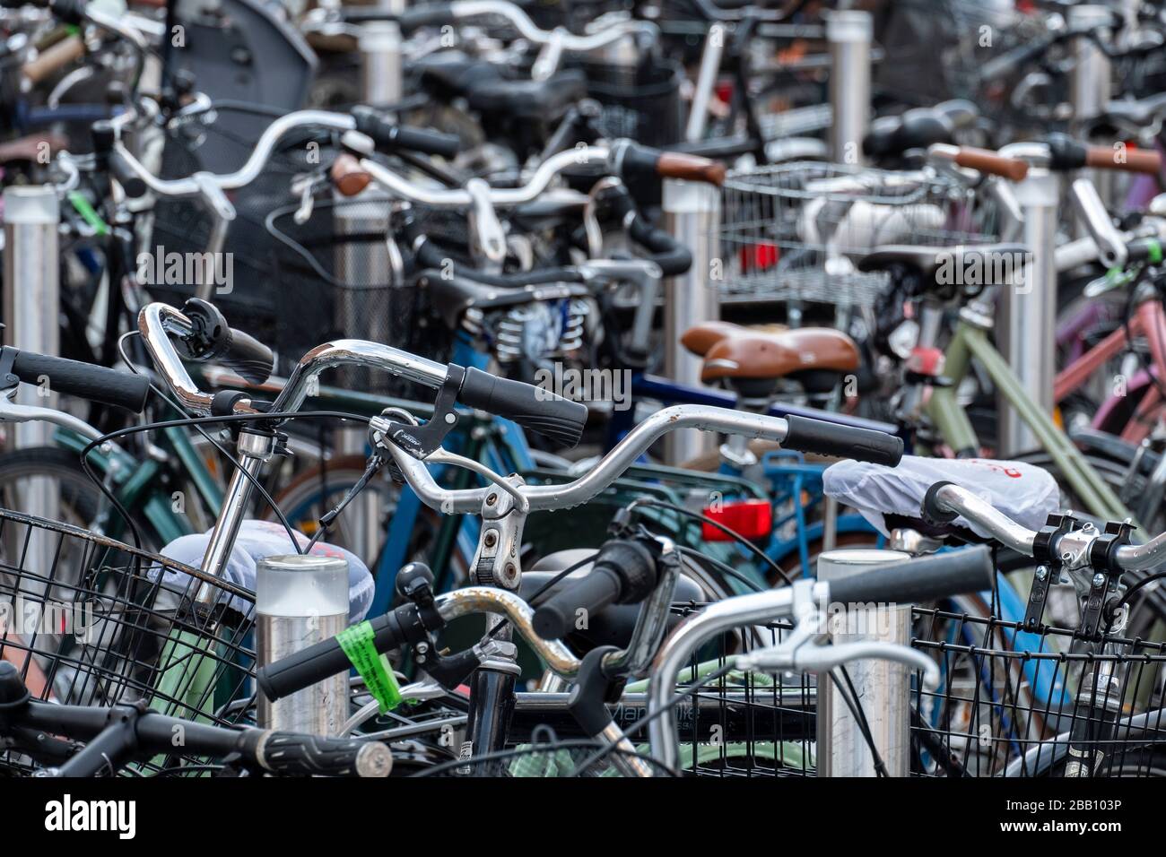 Overcrowded bicycle parking Stock Photo