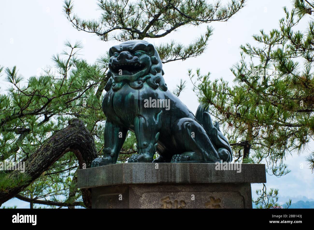 Komainu (Agyo) - Guardian Lion - Itsukushima Sanctuary - Miyajima Island - Hiroshima Stock Photo