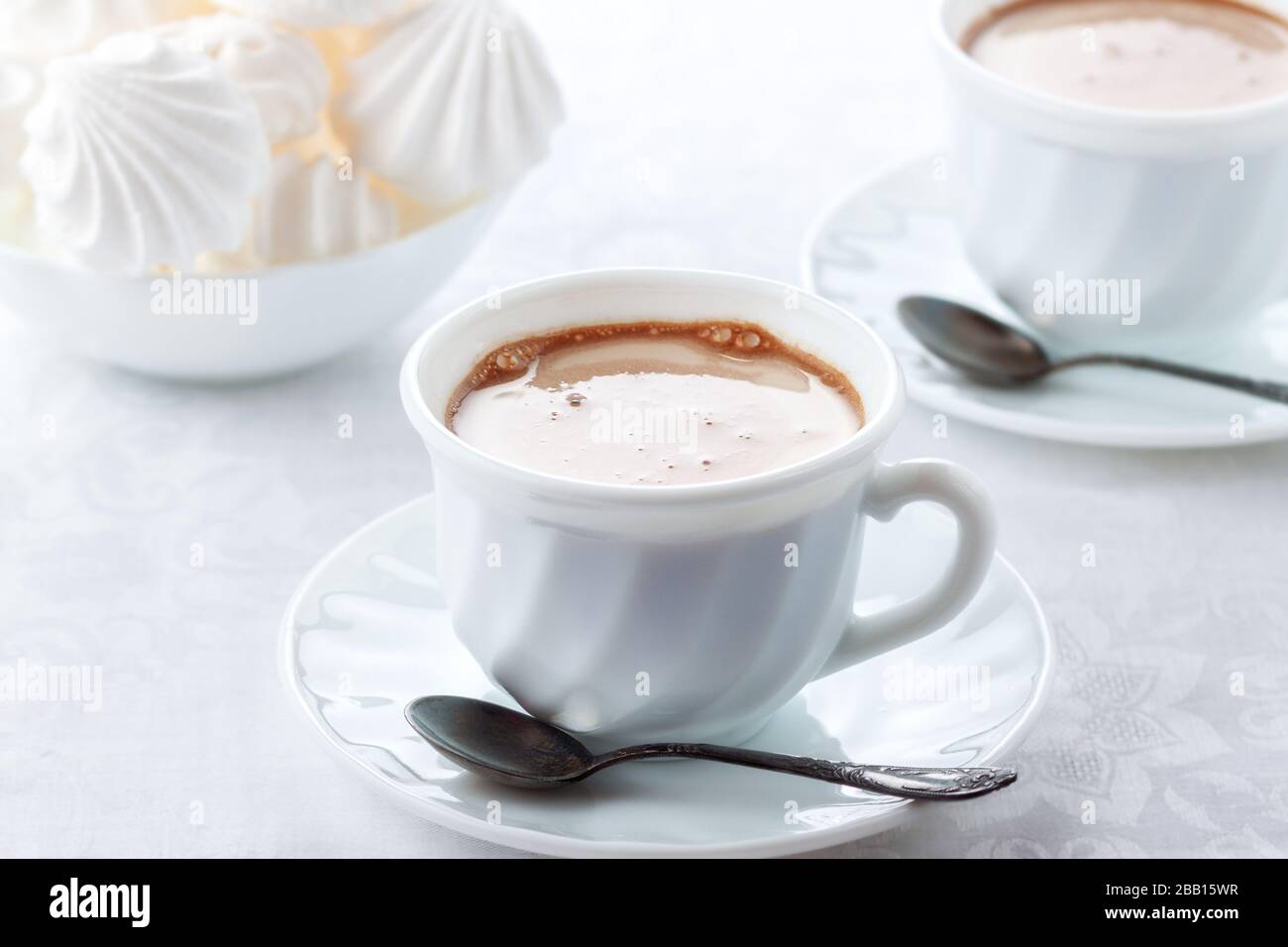 A cup of fresh coffee with cream and a gentle, airy Bizet Stock Photo