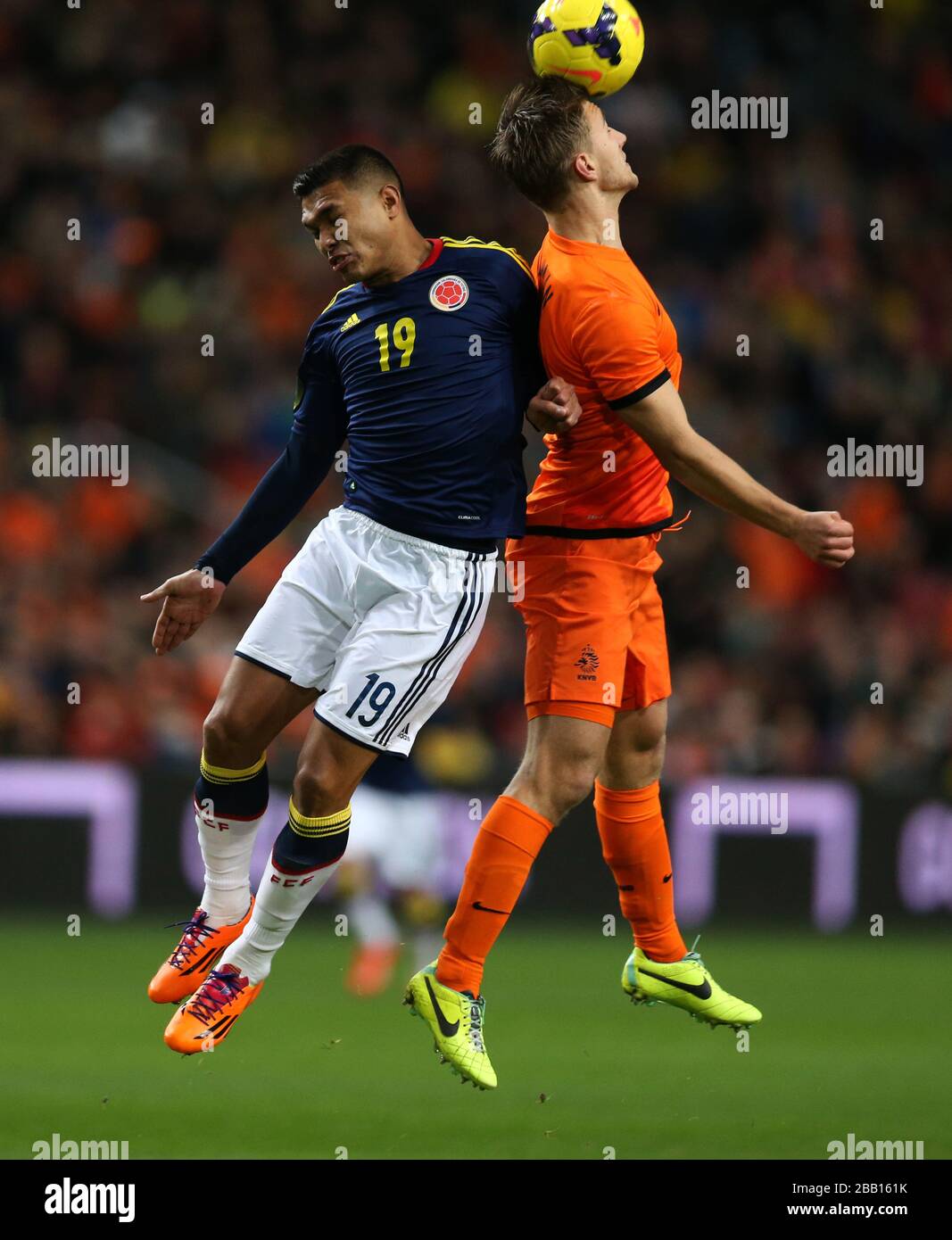 Netherlands' Joel Veltman (right) and Colombia's Teofilo Gutierrez battle for the ball in the air Stock Photo