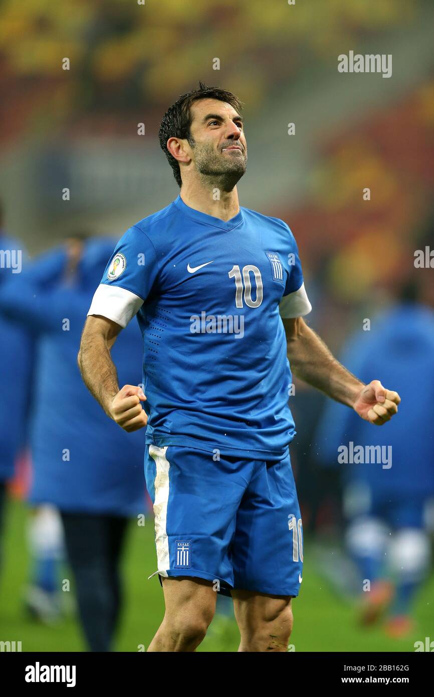 Greece's Georgios Karagounis celebrates victory and qualification for the World Cup Finals at the end of the match Stock Photo