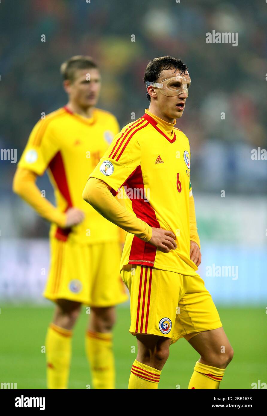 Romania's Vlad lulian Chiriches stands dejected after defeat to Greece Stock Photo