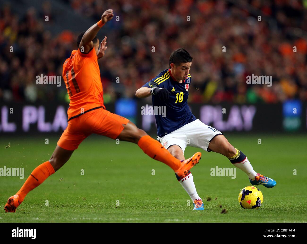 Netherlands' Memphis Depay and Colombia's James Rodriguez (right) Stock Photo