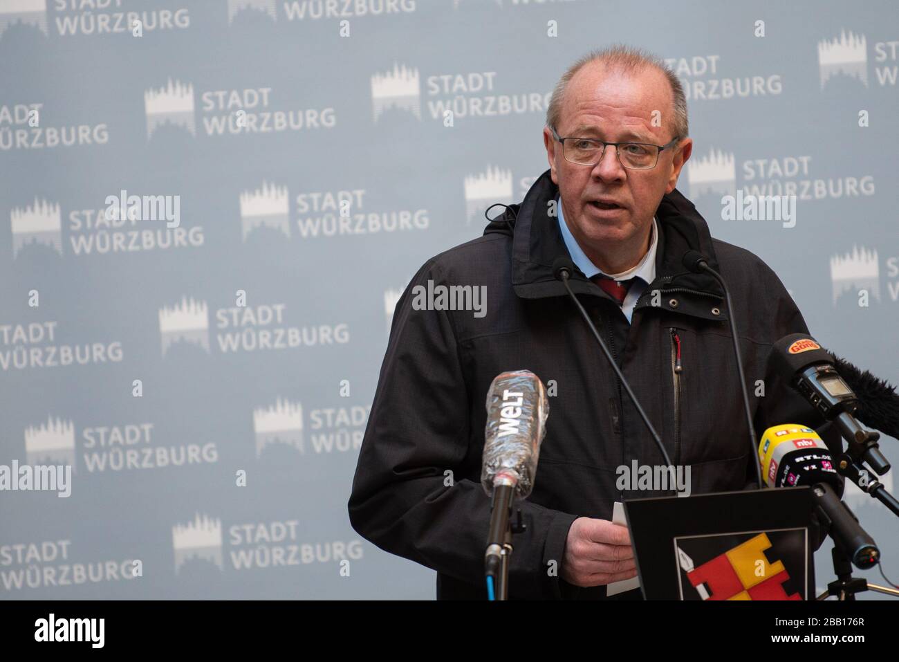 30 March 2020, Bavaria, Würzburg: The head of the public health department, Johann Löw, speaks at the press conference on the current situation of the city and district of Würzburg regarding the spread of the coronavirus. Photo: Nicolas Armer/dpa Stock Photo