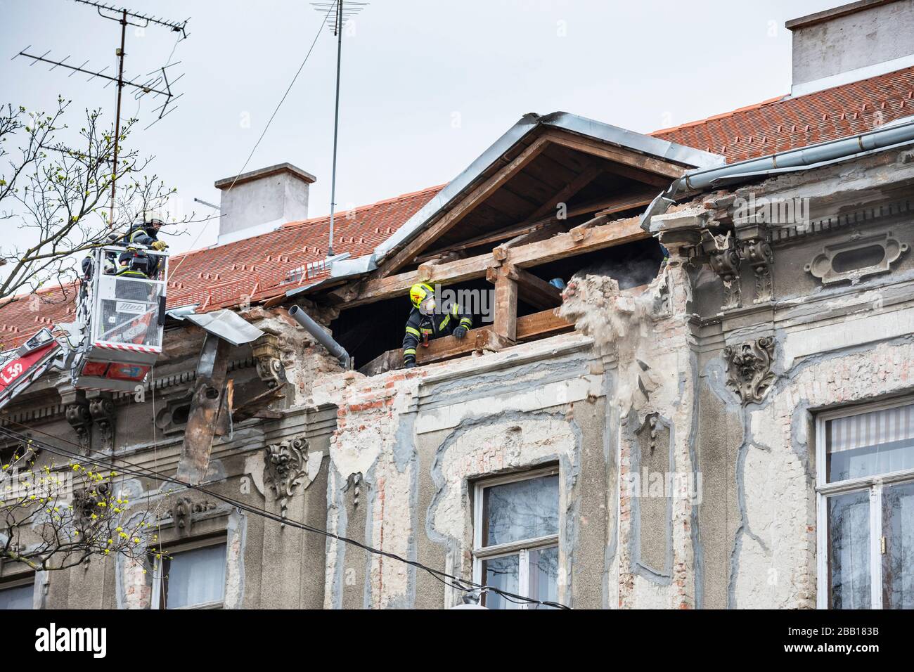 Zagreb, firefighters cleaning damaged rooftops after earthquake Stock Photo