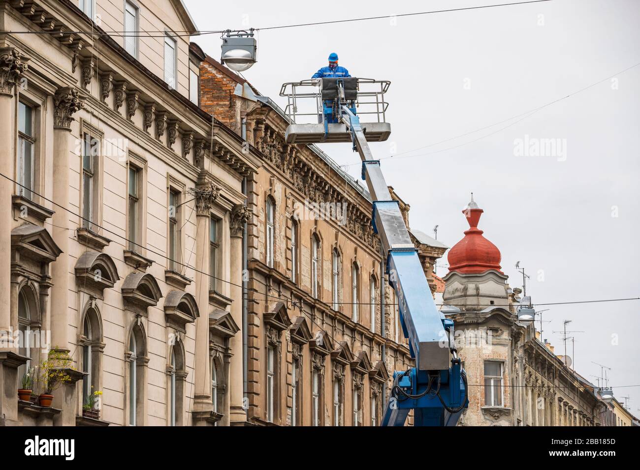 Zagreb, workers cleaning damaged rooftops after earthquake Stock Photo