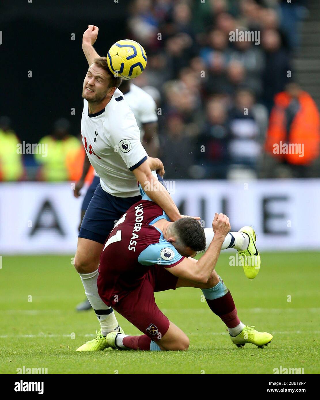 Tottenham Hotspur's Eric Dier (left) and West Ham United's Robert Snodgrass battle for the ball Stock Photo