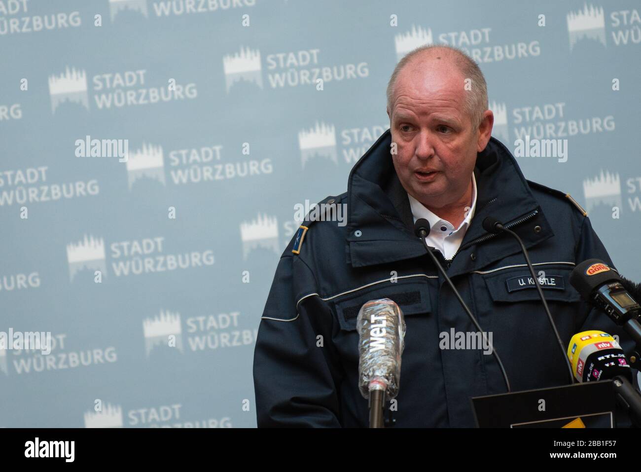 30 March 2020, Bavaria, Würzburg: At the press conference, Uwe Kinstle, Regional Director of the Johanniter-Unfall-Hilfe Würzburg, will speak about the current situation of the city and district of Würzburg regarding the spread of the coronavirus. Photo: Nicolas Armer/dpa Stock Photo