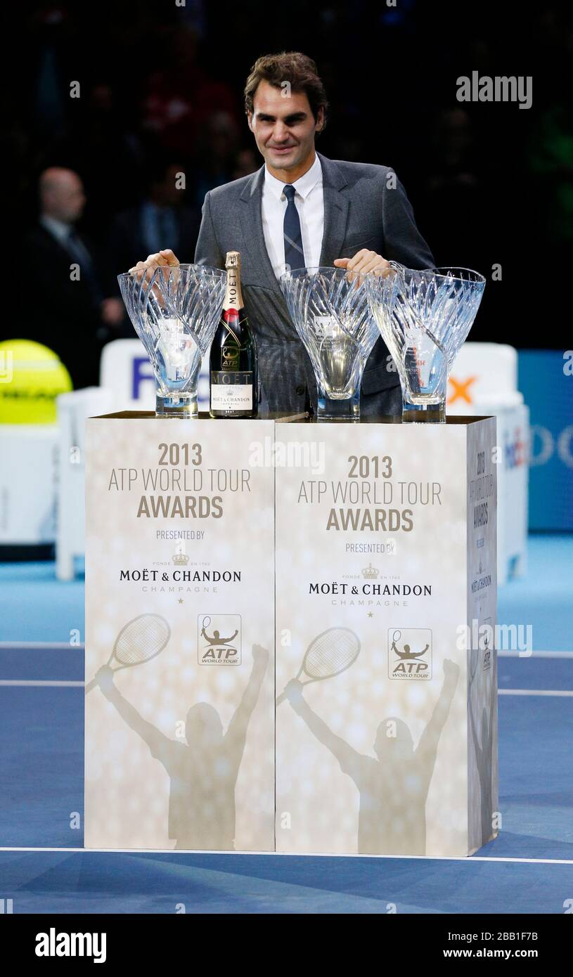 Roger Federer is presented with the ATP Tour Fans Favourite Award, Arthur  Ashe Humanitarian of the Year Award, and the Stefan Edberg Sportsmnaship  Award during day three of the Barclays ATP World