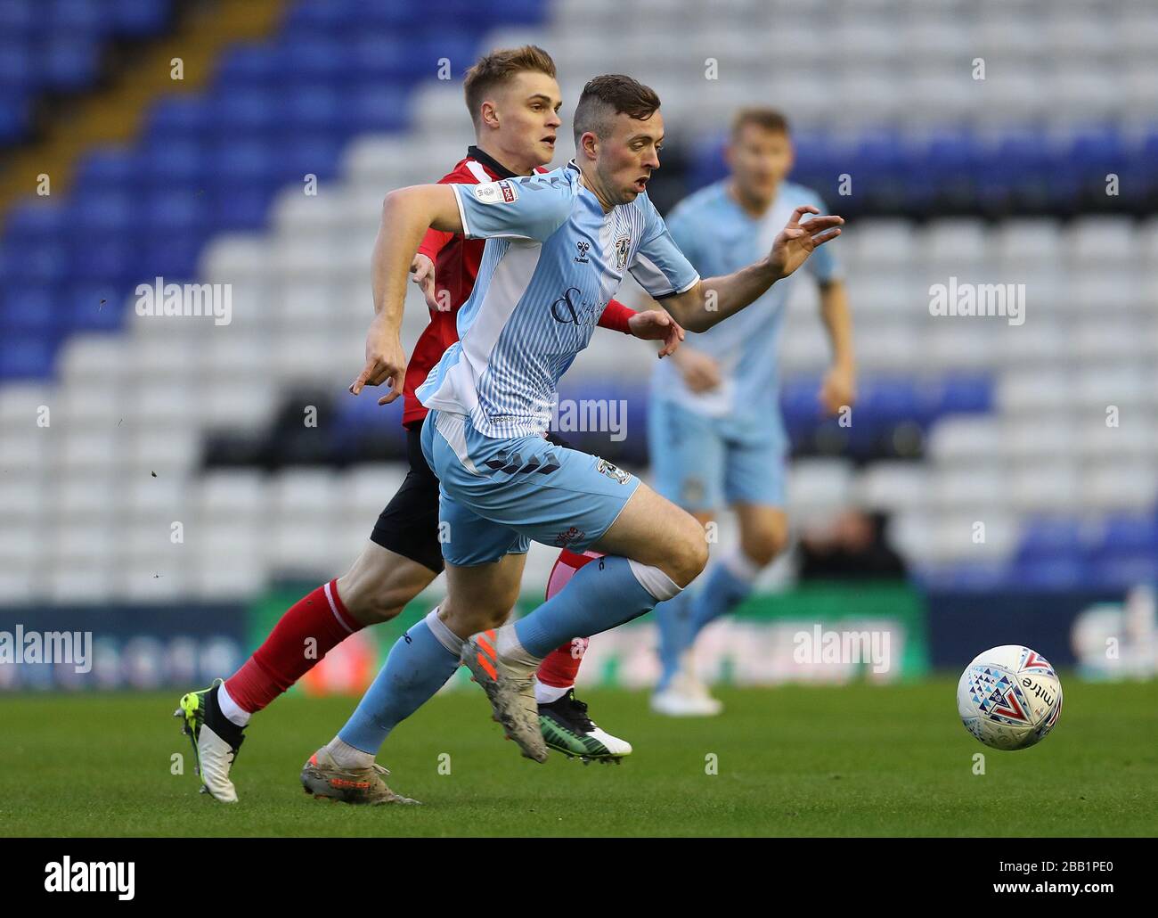 Coventry City's Jordan Shipley (right) and Lincoln City's Michael O