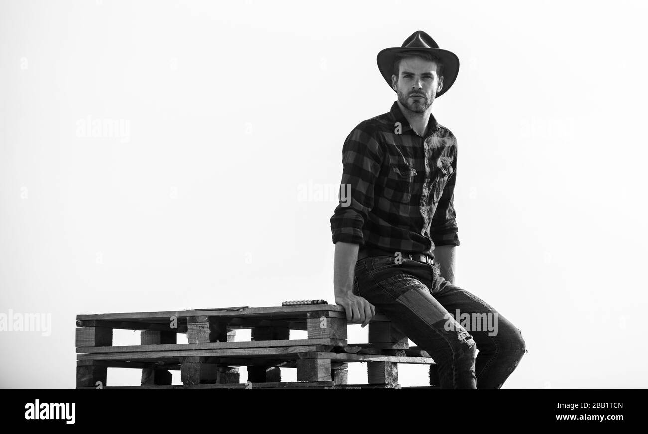 from the country. Vintage style man. Wild West retro cowboy. cowboy sit ...