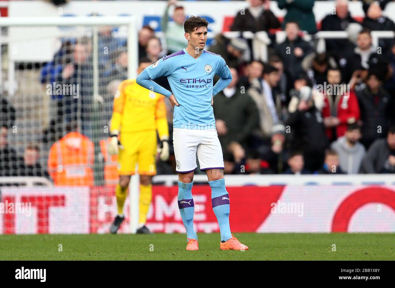 Manchester City's John Stones appears dejected after Newcastle United's Jetro Willems (not pictured) scores his sides first goal Stock Photo
