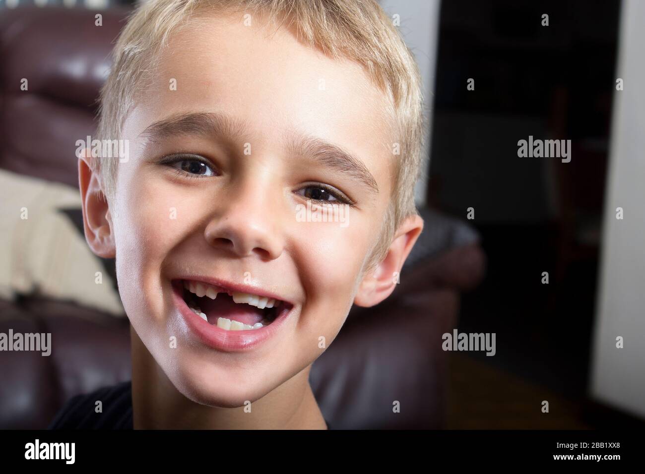 Boy blonde hair brown eyes hi-res stock photography and images - Alamy