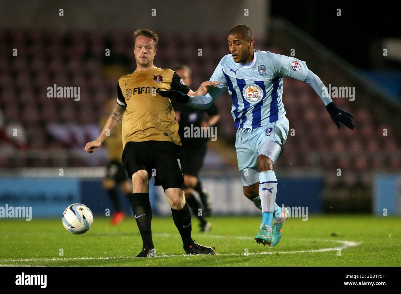 Coventry City's Leon Clarke (right) and Leyton Orient's Nathan Clarke (left) battle for the Stock Photo