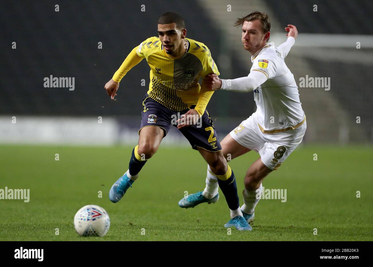 Coventry City’s Tennai Watsoin (left) in action with Milton Keynes Dons