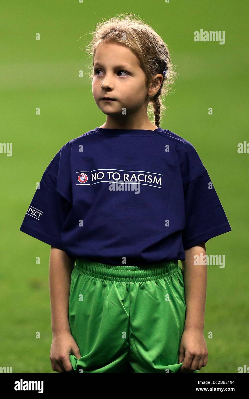 A Mascot wearing A No to Racism t-shirt Stock Photo - Alamy