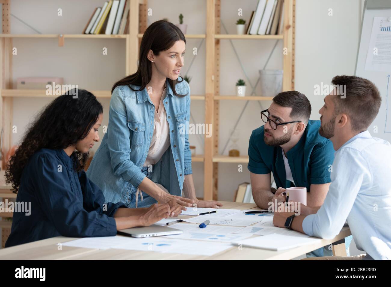 Diverse colleagues brainstorm discussing ideas at meeting Stock Photo ...