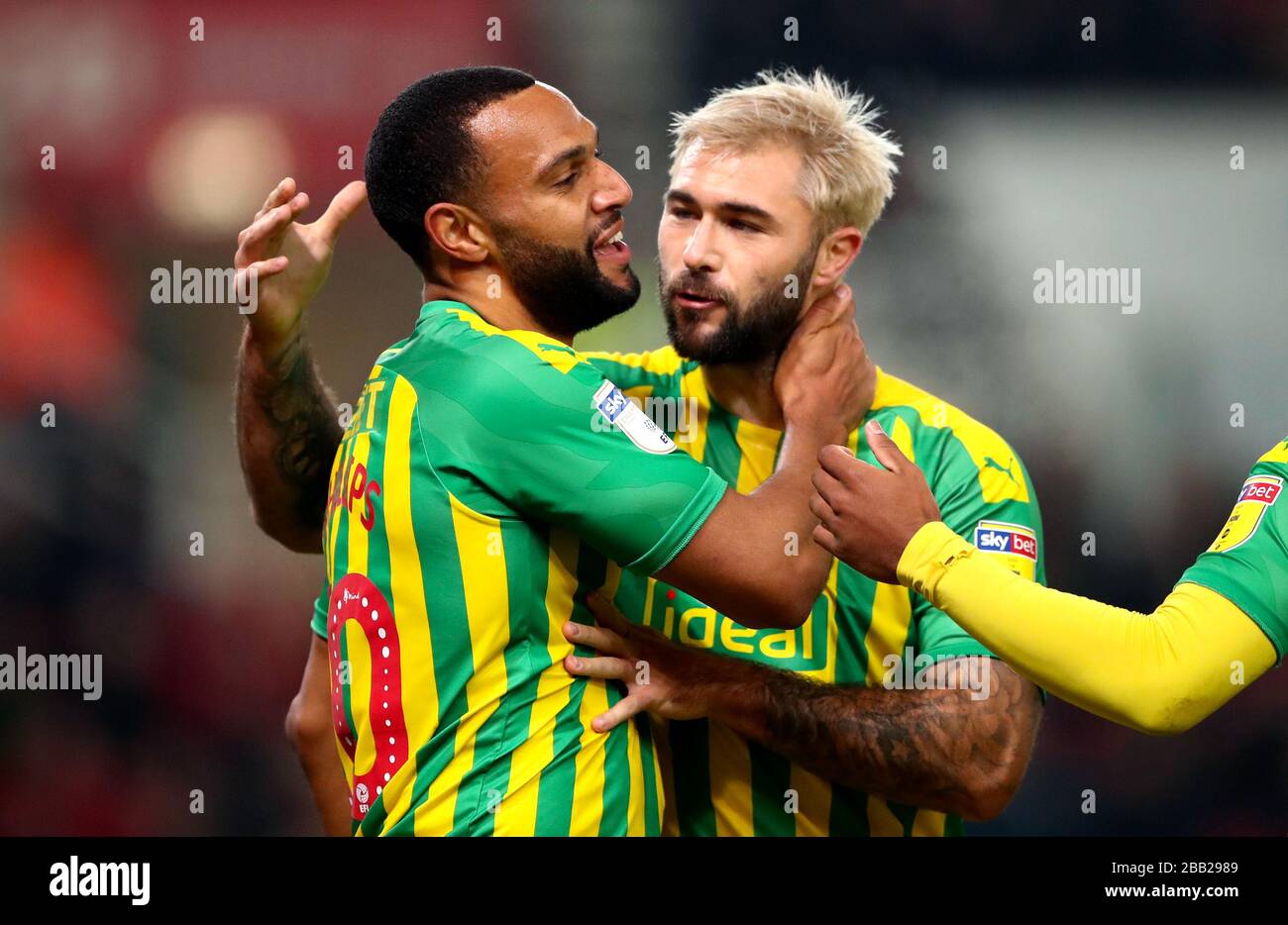 West Bromwich Albion's Matt Phillips (left) celebrates scoring his side's first goal of the game with team mate Charlie Austin Stock Photo