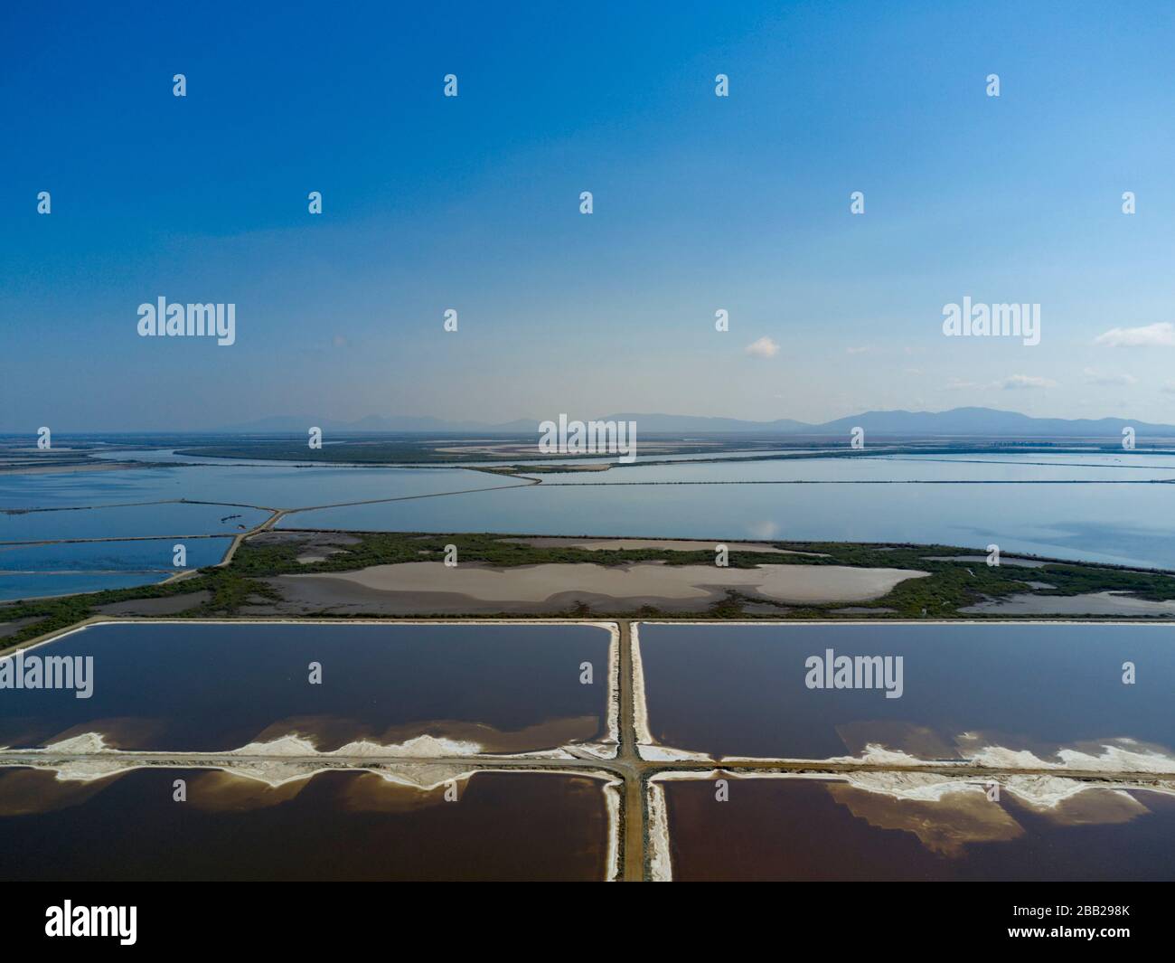 Salt harvesting using solar evaporation ponds at Port Alma Queensland ...