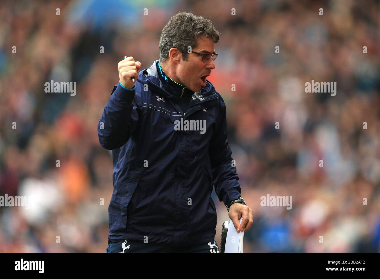Tottenham Hotspur's first-team fitness coach Jose Mario Rocha on the touchline Stock Photo