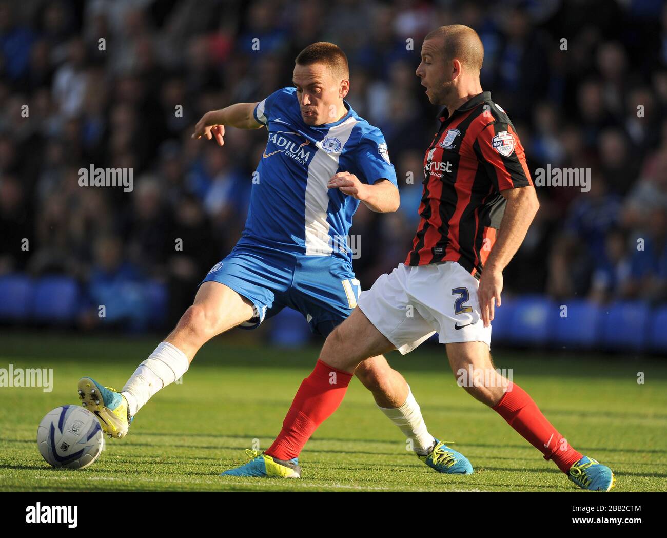 Peterborough United's Paul Taylor (left) and Preston North End's Keith